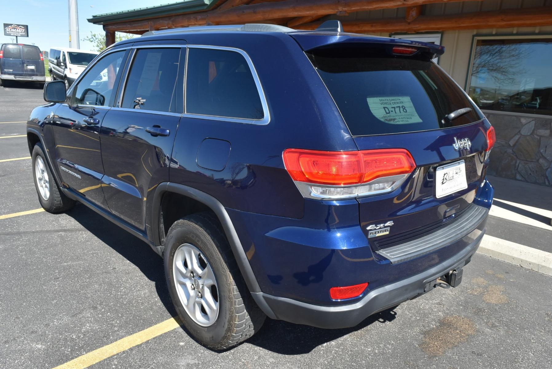 2014 Blue /Black Jeep Grand Cherokee Laredo (1C4RJFAG6EC) with an 3.6L V6 24 Valve VVT engine, 8-Speed Automatic transmission, located at 1600 E Hwy 44, Rapid City, SD, 57703, (605) 716-7878, 44.070232, -103.171410 - Photo #5